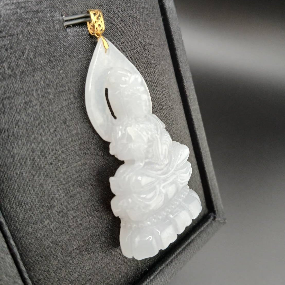 #944 Burma White Jadeite Guanyin Pendant with 18 Karat Yellow Gold Bail and Display
