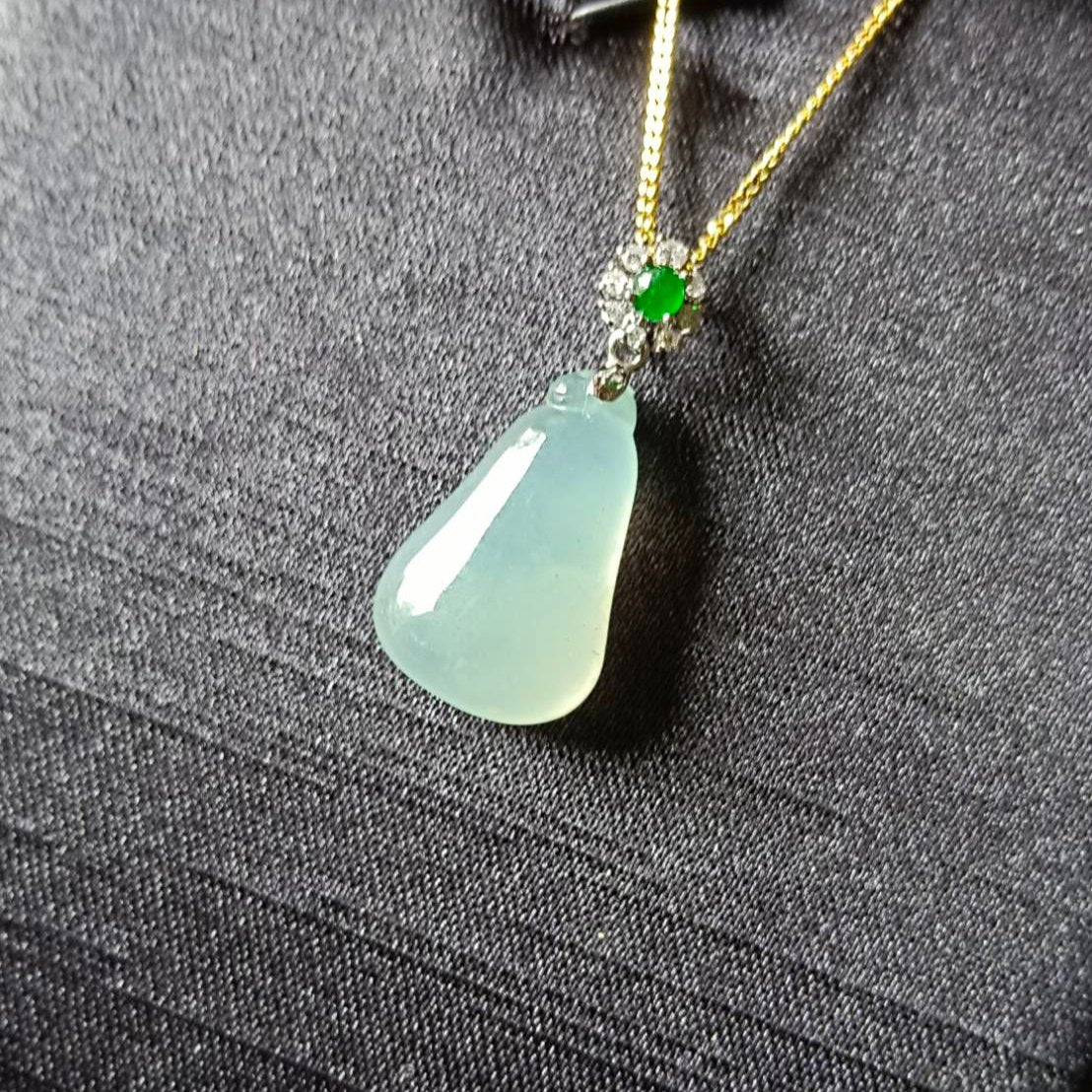 #818 AGL Certified Natural Semi-Transparent Burma Jadeite, Fu Gua 福瓜 Pendant, 18KG Bail with an Imperial Green Cabochon, and Diamonds