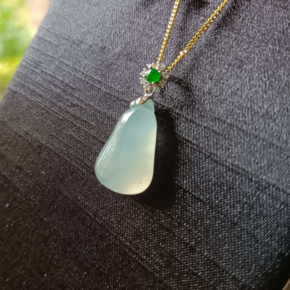 #818 AGL Certified Natural Semi-Transparent Burma Jadeite, Fu Gua 福瓜 Pendant, 18KG Bail with an Imperial Green Cabochon, and Diamonds