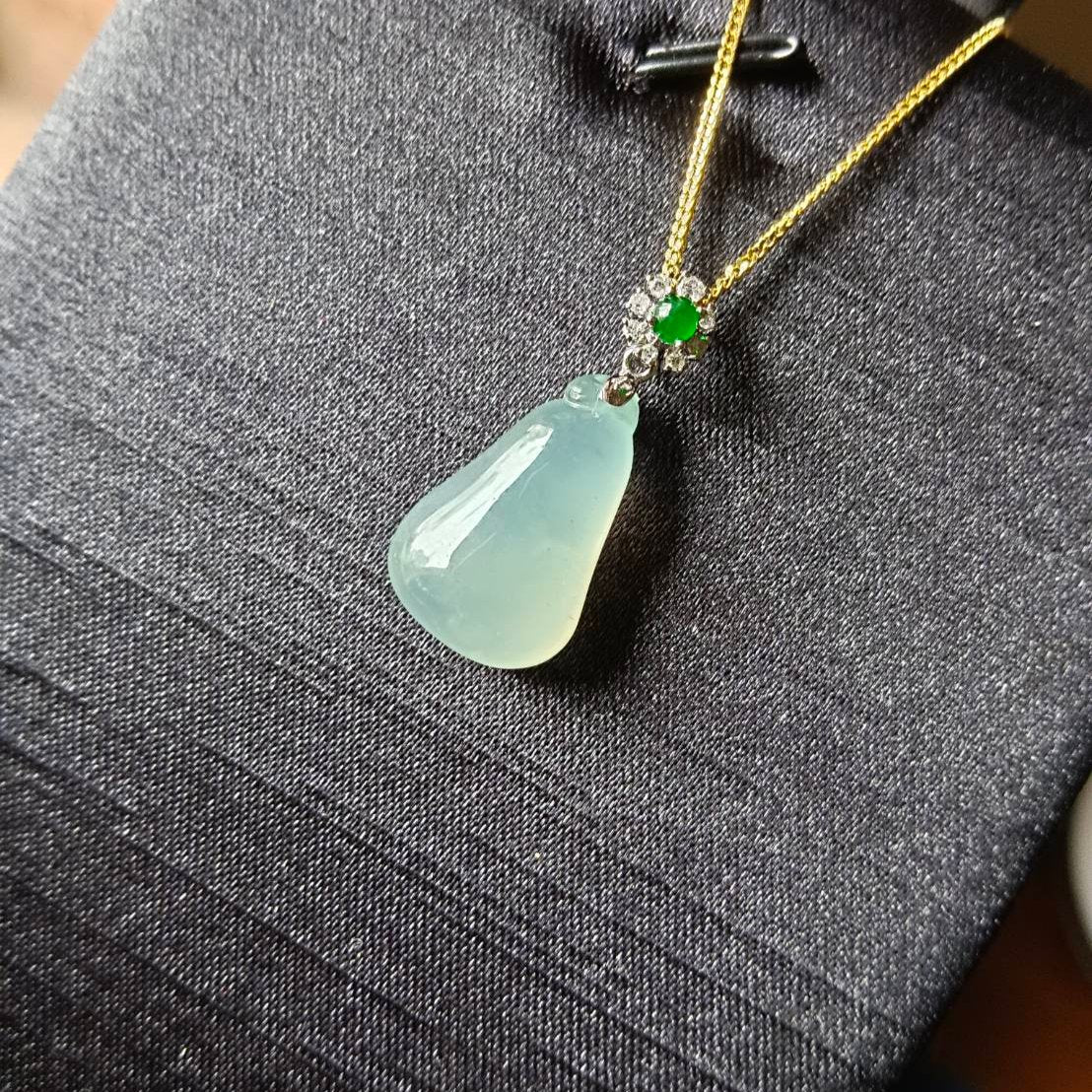 #818 AGL Certified Natural Semi-Transparent Burma Jadeite, Fu Gua 福瓜 Pendant, 18KG Bail with an Imperial Green Cabochon, and Diamonds