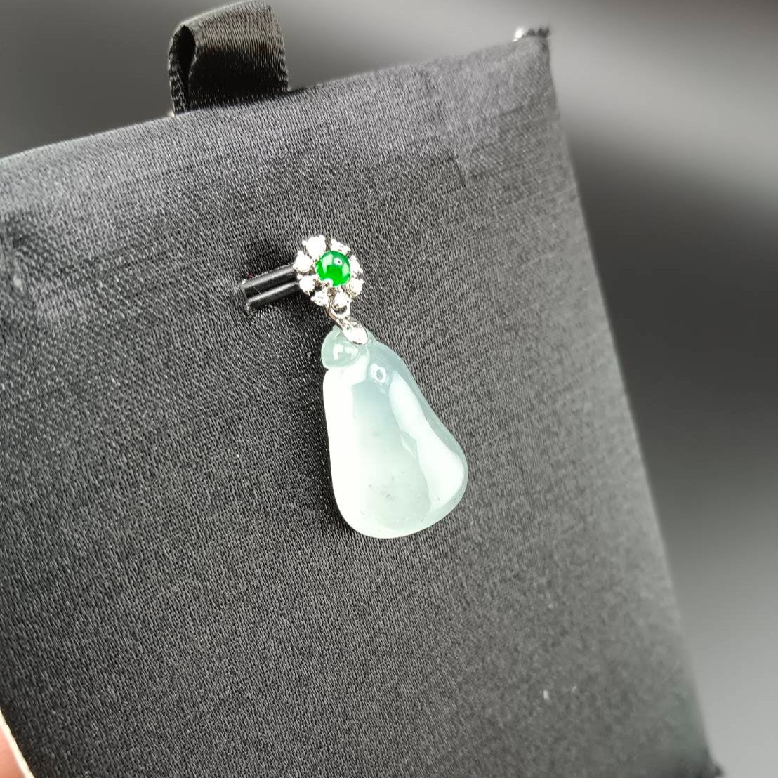#818 AGL Certified Natural Semi-Transparent Burma Jadeite, Fu Gua 福瓜 Pendant, 18KG Bail with an Imperial Green Cabochon, and Diamonds