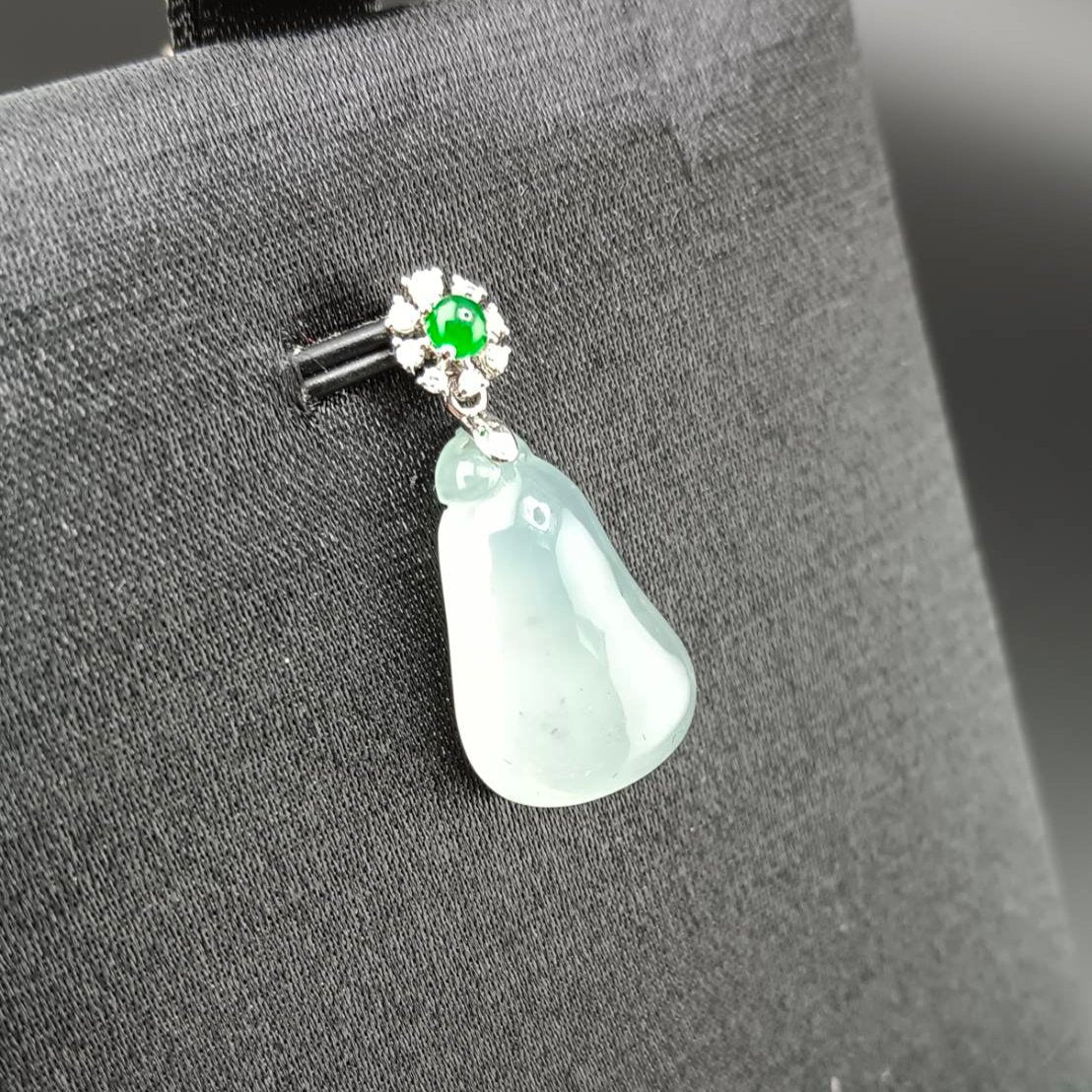 #818 AGL Certified Natural Semi-Transparent Burma Jadeite, Fu Gua 福瓜 Pendant, 18KG Bail with an Imperial Green Cabochon, and Diamonds