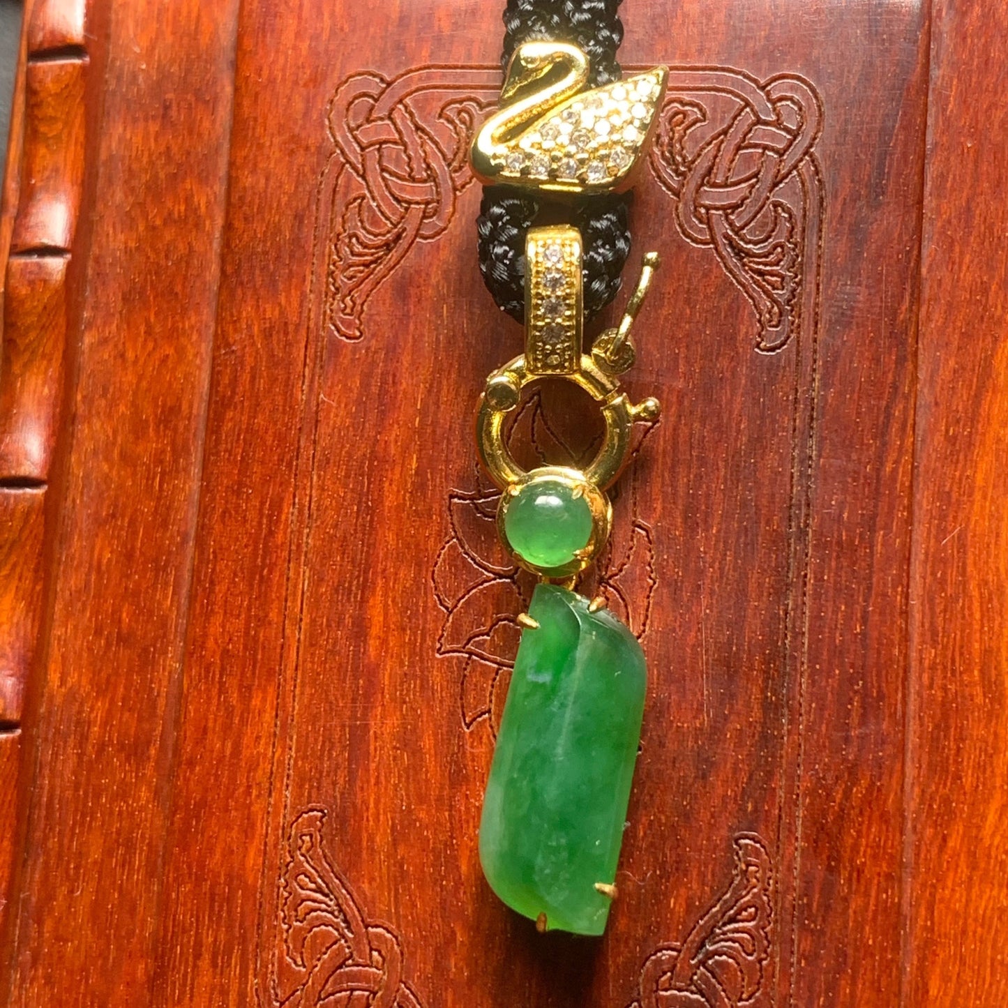 #797 AGL Certified Translucent Burma Jadeite, Green Free-Form Shape Pendant in an 18K Gold Holder