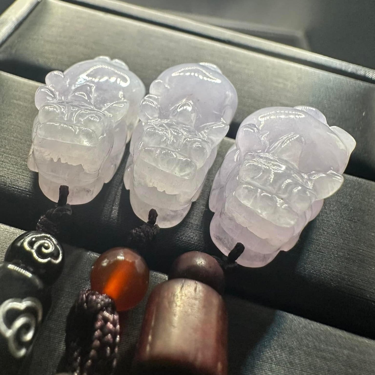 #848, the AGL Certified Natural Translucent Lavender Burma Jadeite Pixiu Triplets Pendants
