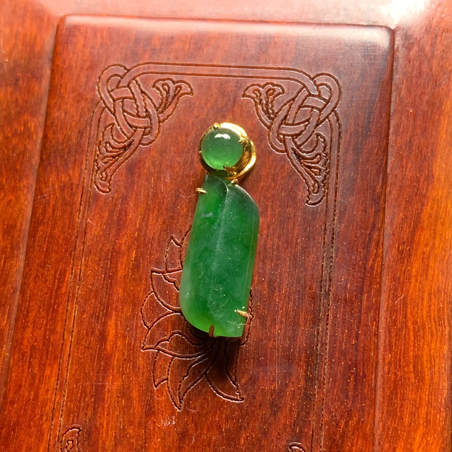 #797 AGL Certified Translucent Burma Jadeite, Green Free-Form Shape Pendant in an 18K Gold Holder
