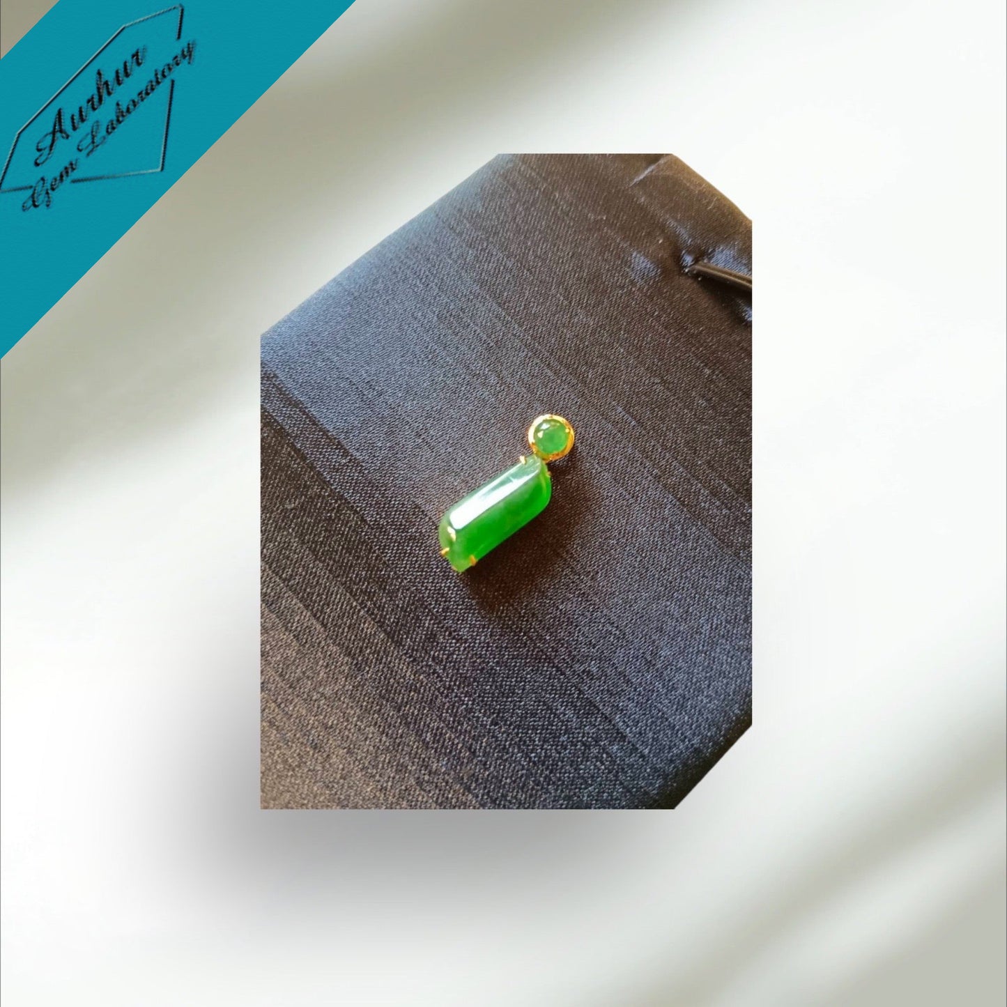 #797 AGL Certified Translucent Burma Jadeite, Green Free-Form Shape Pendant in an 18K Gold Holder