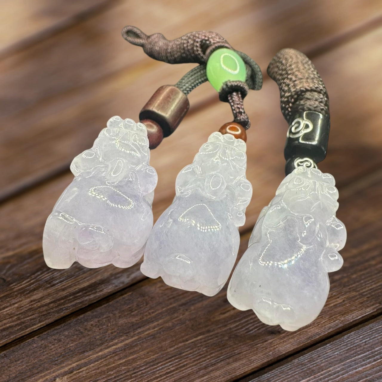 #848, the AGL Certified Natural Translucent Lavender Burma Jadeite Pixiu Triplets Pendants