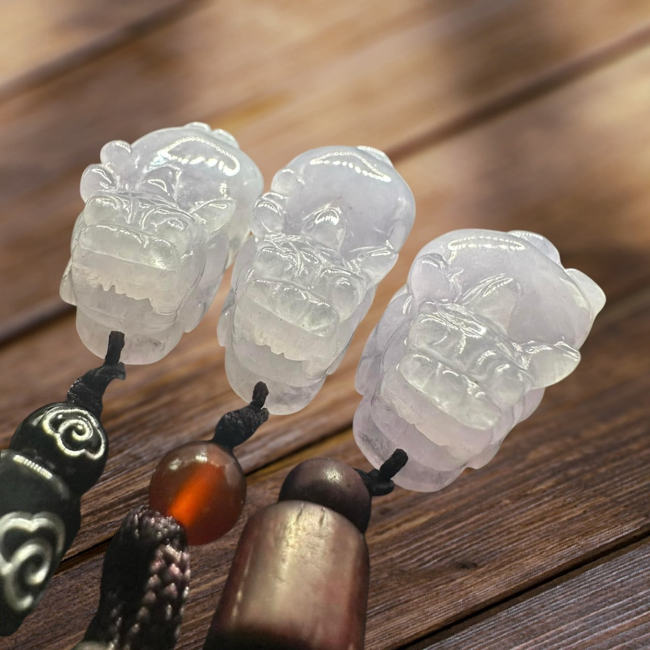 #848, the AGL Certified Natural Translucent Lavender Burma Jadeite Pixiu Triplets Pendants