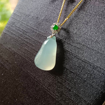 #818 AGL Certified Natural Semi-Transparent Burma Jadeite, Fu Gua 福瓜 Pendant, 18KG Bail with an Imperial Green Cabochon, and Diamonds