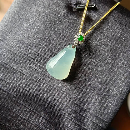 #818 AGL Certified Natural Semi-Transparent Burma Jadeite, Fu Gua 福瓜 Pendant, 18KG Bail with an Imperial Green Cabochon, and Diamonds
