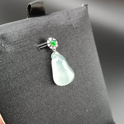 #818 AGL Certified Natural Semi-Transparent Burma Jadeite, Fu Gua 福瓜 Pendant, 18KG Bail with an Imperial Green Cabochon, and Diamonds