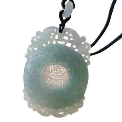#1038 Icy Green Burmese Jadeite “Shou” Amulet